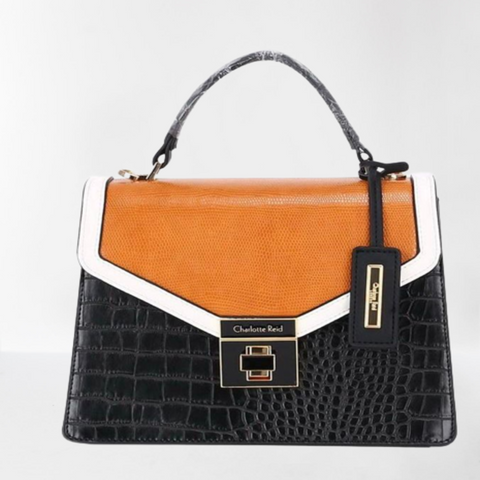 Charlotte Reid London purses... - The Queen B Boutique | Facebook